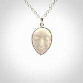 Hand made woolly mammoth tusk moon face necklace and matching earrings